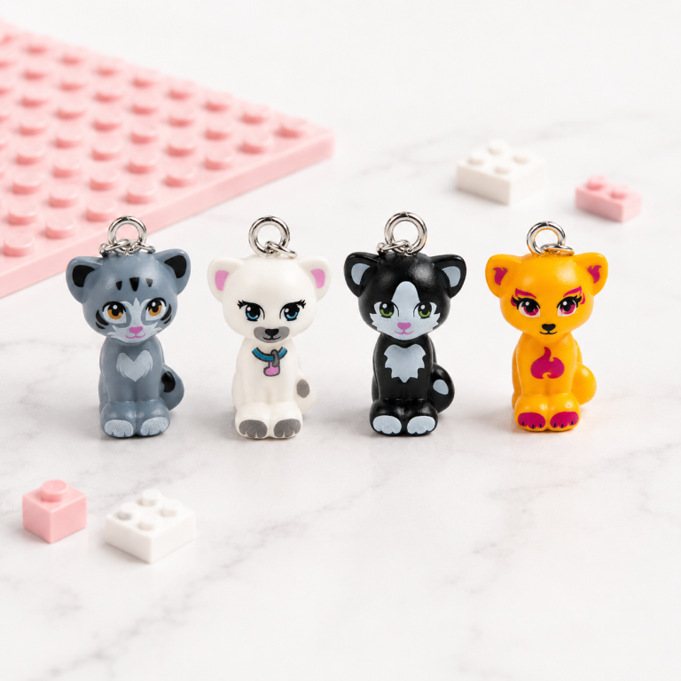 Four cat charms in gray, white, black and yellow