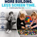 Children building together on the BrickPack playmat